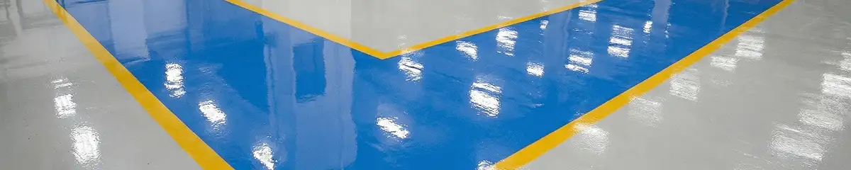 A factory floor professionally covered and marked with epoxy flooring in Honolulu, HI