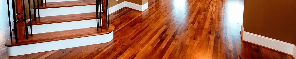 Base floor of a staircase with professionally restored wood flooring in Honolulu HI