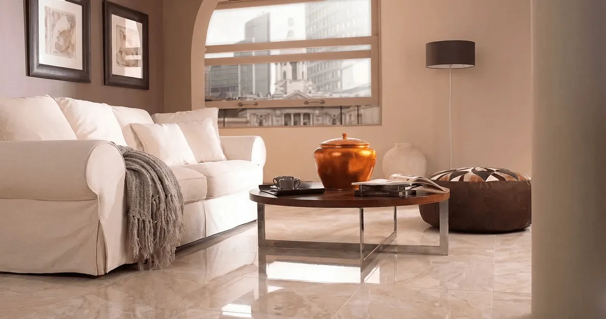 Modern living room with professionally installed marble flooring, a beige sofa, coffee table in Honolulu, HI