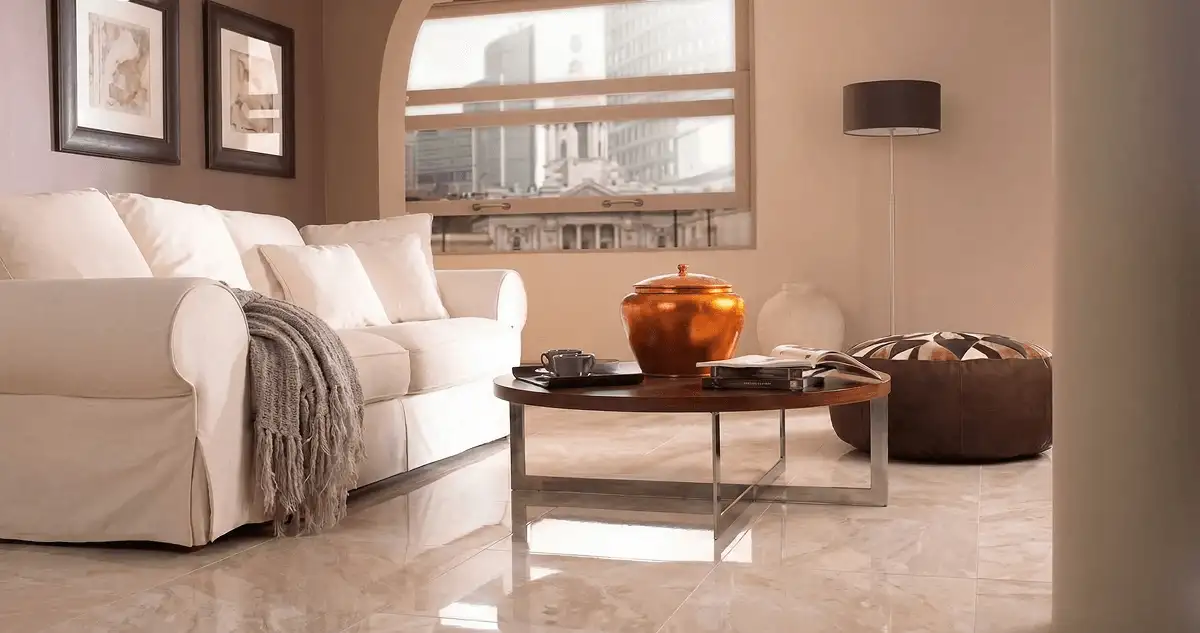Modern living room with professionally installed marble flooring, a beige sofa, coffee table in Honolulu, HI