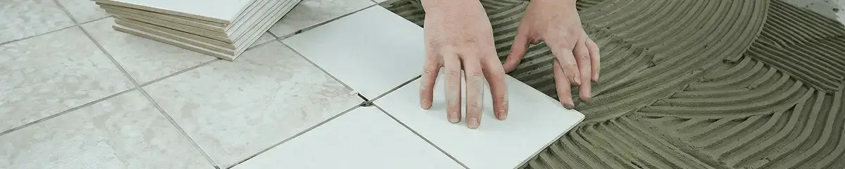 Professional installing white tile floors in Honolulu, HI